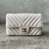 Chanel 18B Ivory Mini Rectangular Flap in Chevron Quilting, Caviar Leather & Light Gold Hardware