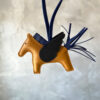 Hermes Rodeo Pegase PM charm in Sesame, Blue Sapphire and Black Agneau leather