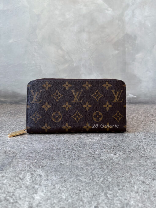 Louis Vuitton Zippy Wallet in Monogram Canvas & Gold Hardware (Fuchsia Interior)