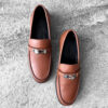 Hermes Gold Destin Loafer in Calfskin Leather & Palladium Kelly Buckle