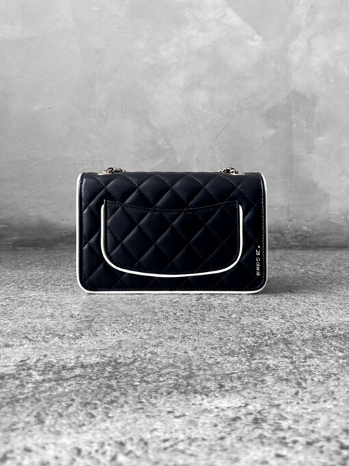 Chanel 25P Black/White Seasonal WOC in Lambskin Leather and Light Gold Hardware