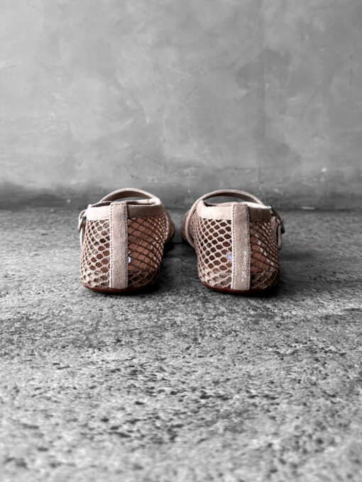 Alaïa Nude Suede Ballet Flats, crafted from soft suede with a timeless, elegant silhouette for versatile everyday wear.