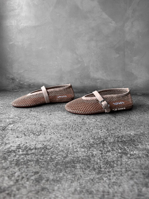 Alaïa Nude Suede Ballet Flats, crafted from soft suede with a timeless, elegant silhouette for versatile everyday wear.