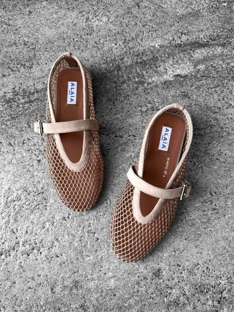 Alaïa Nude Suede Ballet Flats, crafted from soft suede with a timeless, elegant silhouette for versatile everyday wear.