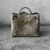Bottega Veneta Small Andiamo Top Handle Bag in Cypress Intrecciato suede. A refined, structured silhouette showcasing timeless craftsmanship and elegance.