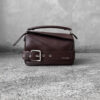 Loewe Small Dark Brownie Puzzle Biker Bag in calfskin leather, blending the iconic Puzzle design with bold biker-inspired detailing.