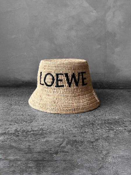 Loewe Natural Raffia Bucket Hat, a lightweight woven design with casual elegance and signature luxury detailing.