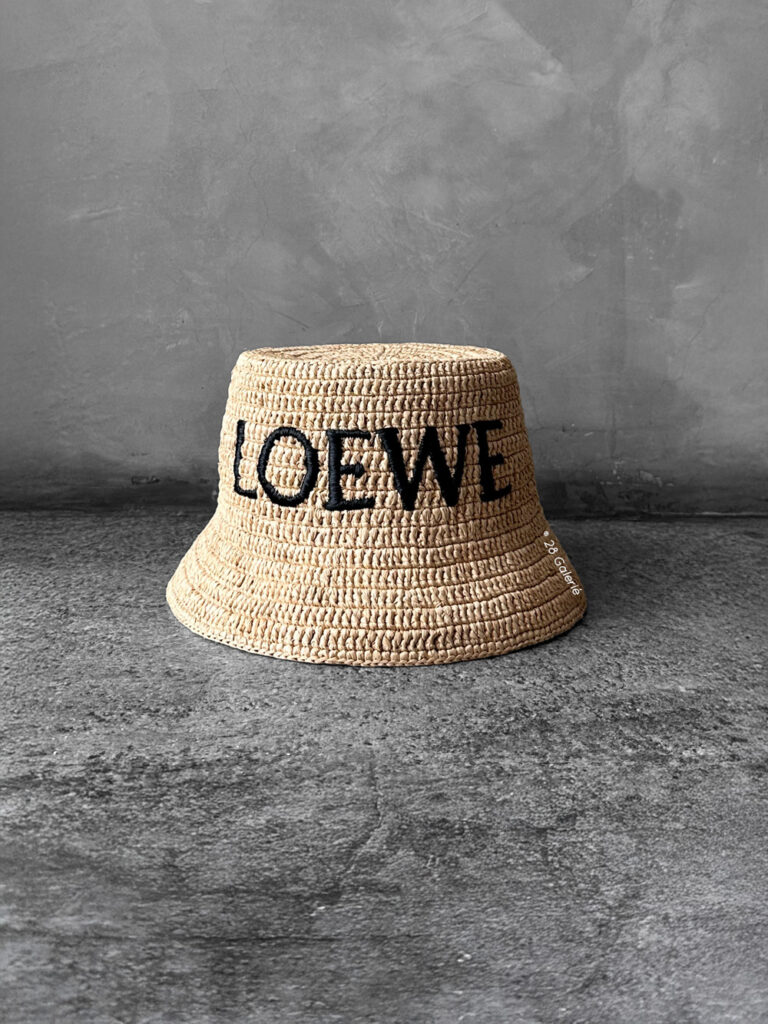 Loewe Natural Raffia Bucket Hat, a lightweight woven design with casual elegance and signature luxury detailing.