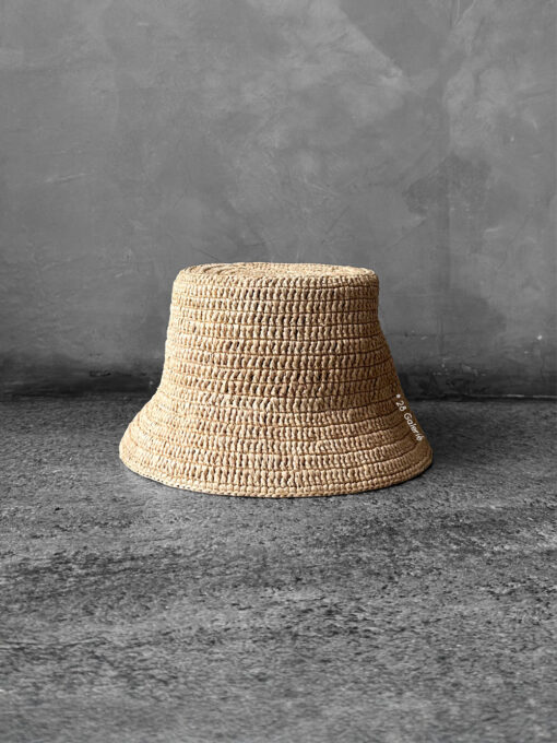 Loewe Natural Raffia Bucket Hat, a lightweight woven design with casual elegance and signature luxury detailing.