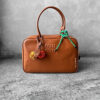 Miu Miu Cognac Large Leather Beau Bag, a structured and spacious design that blends timeless elegance with modern sophistication.