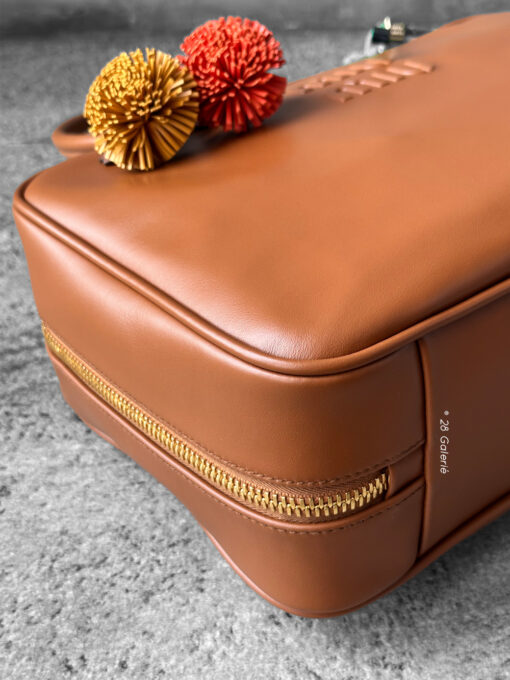 Miu Miu Cognac Large Leather Beau Bag, a structured and spacious design that blends timeless elegance with modern sophistication.