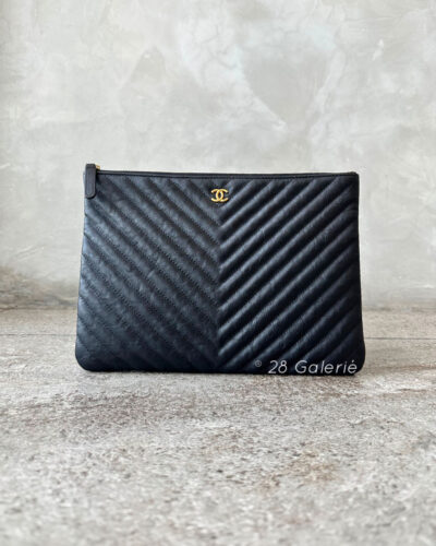 Chanel O Case Chevron Clutch in Calfskin Leather & Aged Gold Hardware
