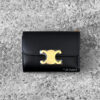 Celine Black Triomphe Detachable Wallet in Shiny Calfskin Leather and Gold Hardware