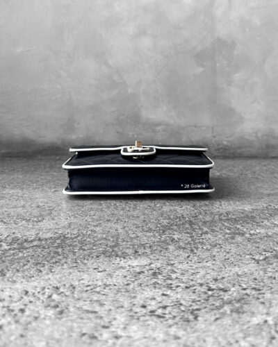 Chanel 25P Black/White Seasonal WOC in Lambskin Leather and Light Gold Hardware