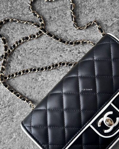 Chanel 25P Black/White Seasonal WOC in Lambskin Leather and Light Gold Hardware