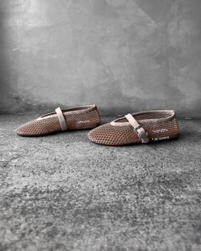 Alaïa Nude Suede Ballet Flats, crafted from soft suede with a timeless, elegant silhouette for versatile everyday wear.