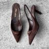 Prada Dark Brown Suede Slingback Pumps with 75mm heel, size 36.5. A timeless, elegant silhouette crafted in soft suede.