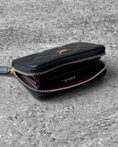 Chanel Black Zippy Card Wallet in Quilted Caviar Leather and Gold Hardware