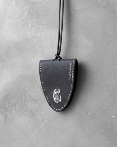 Goyard Grey Croc Universal Bag Clip features a sleek crocodile-embossed design, combining functional versatility with refined luxury for effortless bag styling and secure attachment.